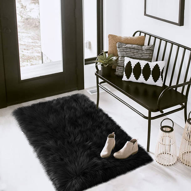 Everly Quinn Handmade Faux Sheepskin Black Rug & Reviews Wayfair